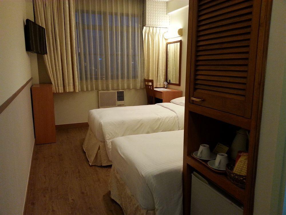 Caritas Lodge Цзюлун Экстерьер фото