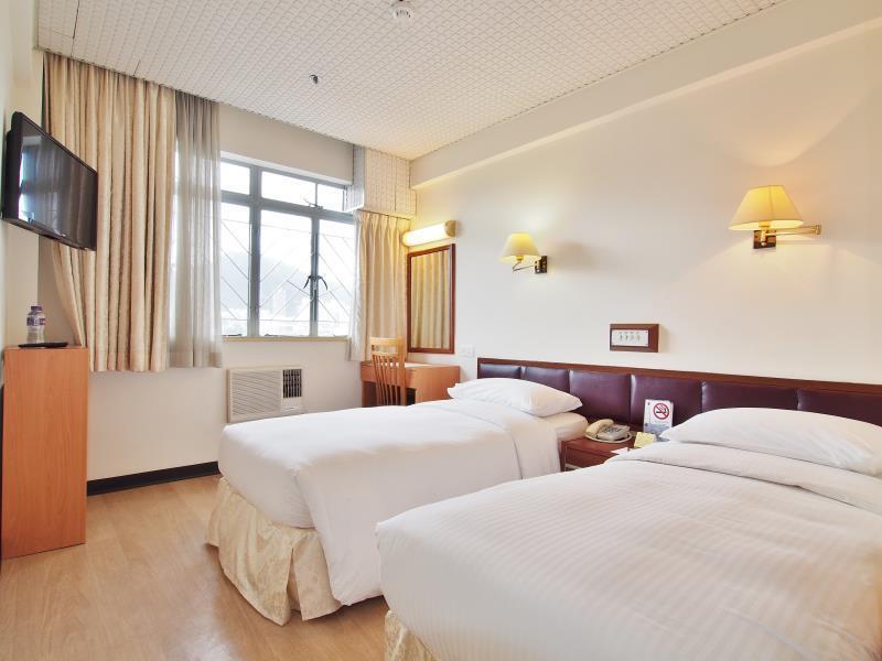 Caritas Lodge Цзюлун Экстерьер фото