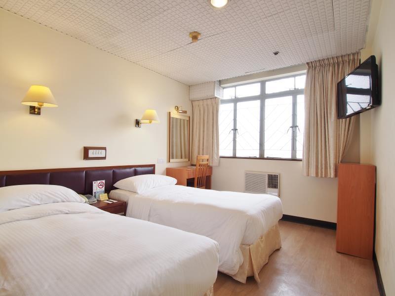 Caritas Lodge Цзюлун Экстерьер фото