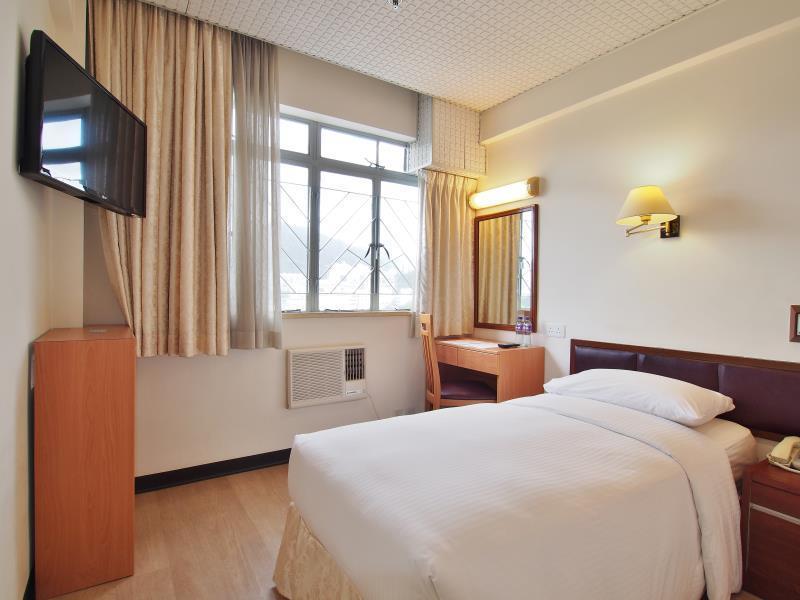 Caritas Lodge Цзюлун Экстерьер фото