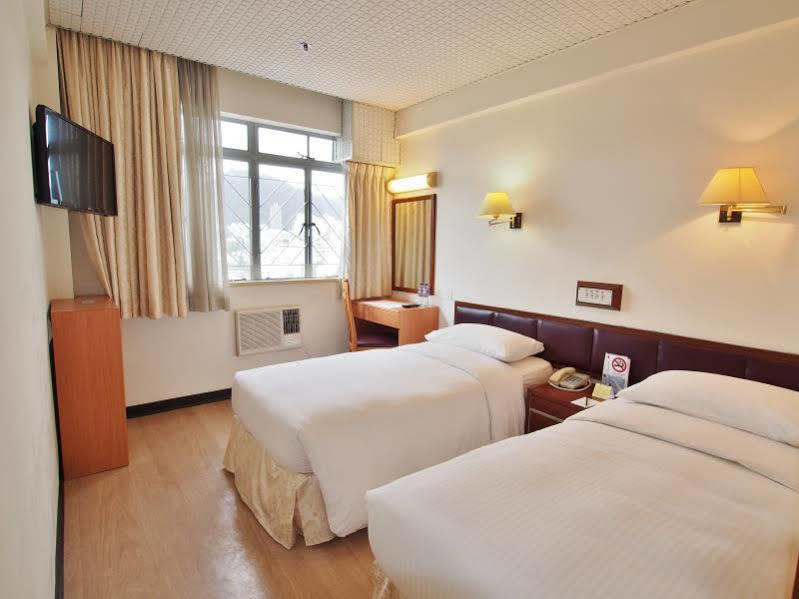 Caritas Lodge Цзюлун Экстерьер фото